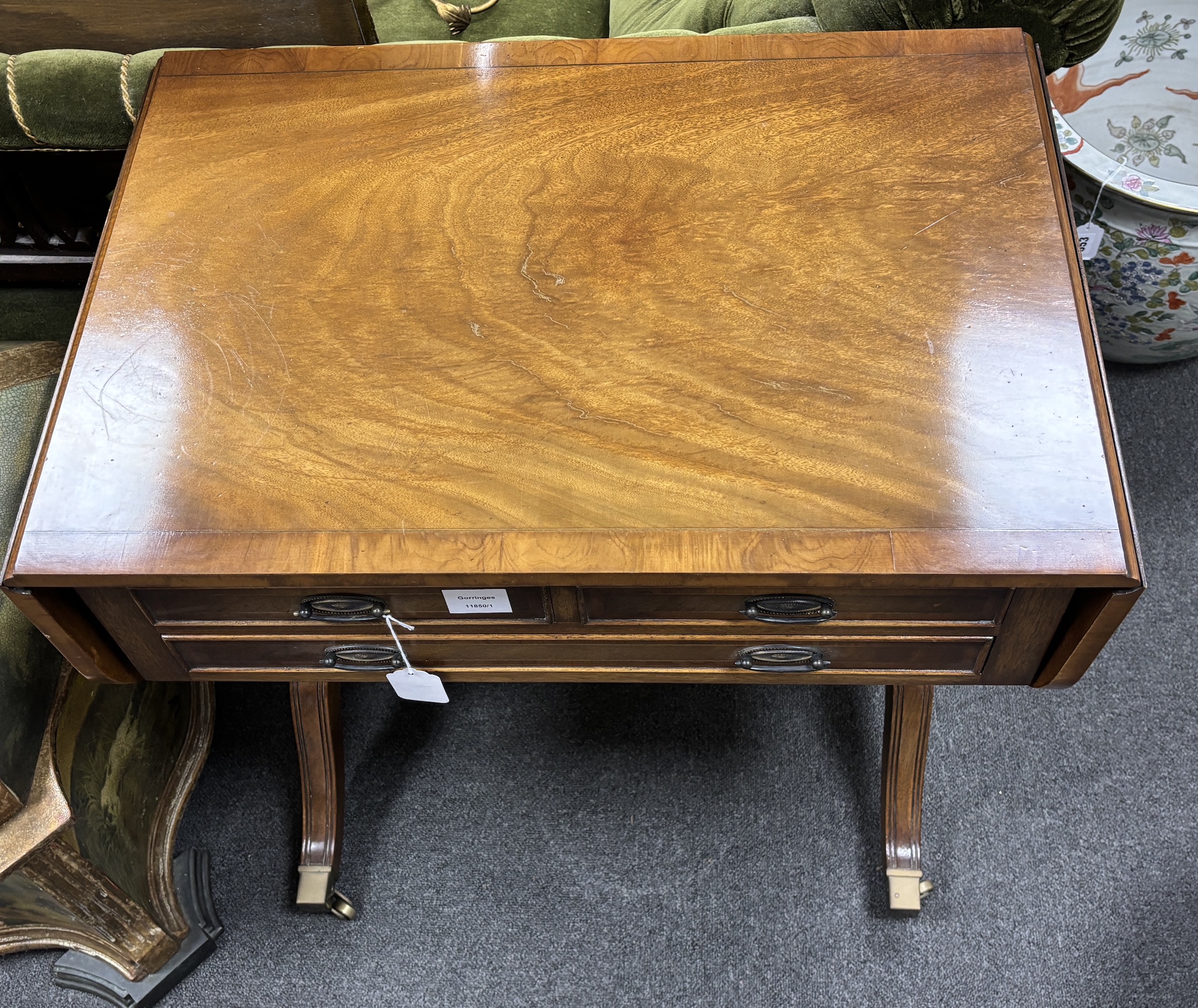A small reproduction Regency style mahogany sofa table, width 68cm, depth 46cm, height 72cm